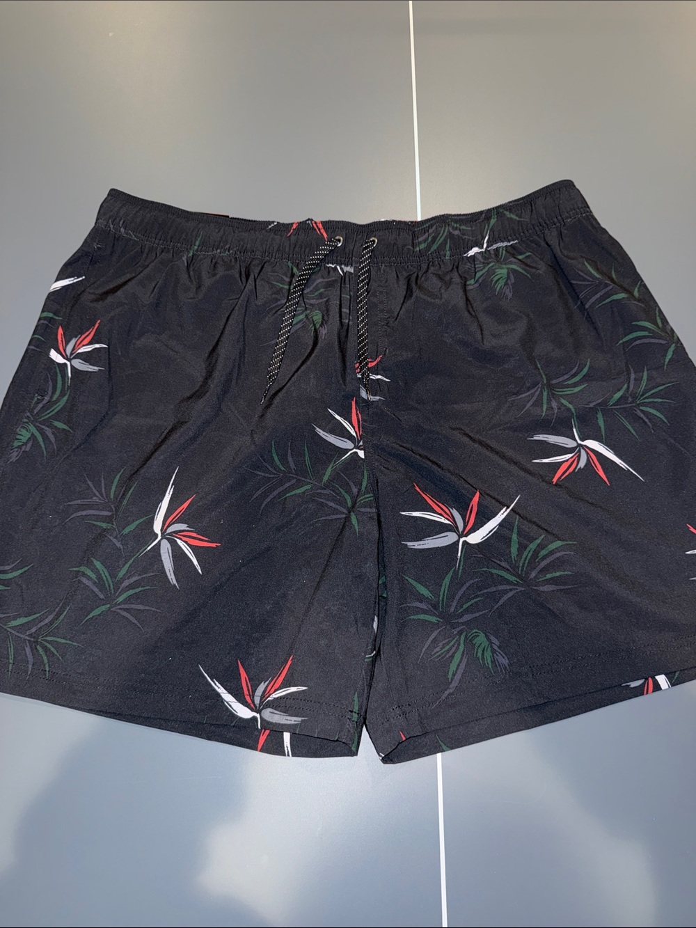 Quiksilver Black Swim Trunks with Red, White & Green Floral Print